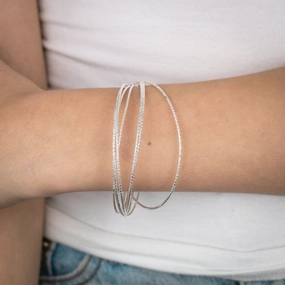 Sterling Silver Textured Bunch Of Seven Bangles
